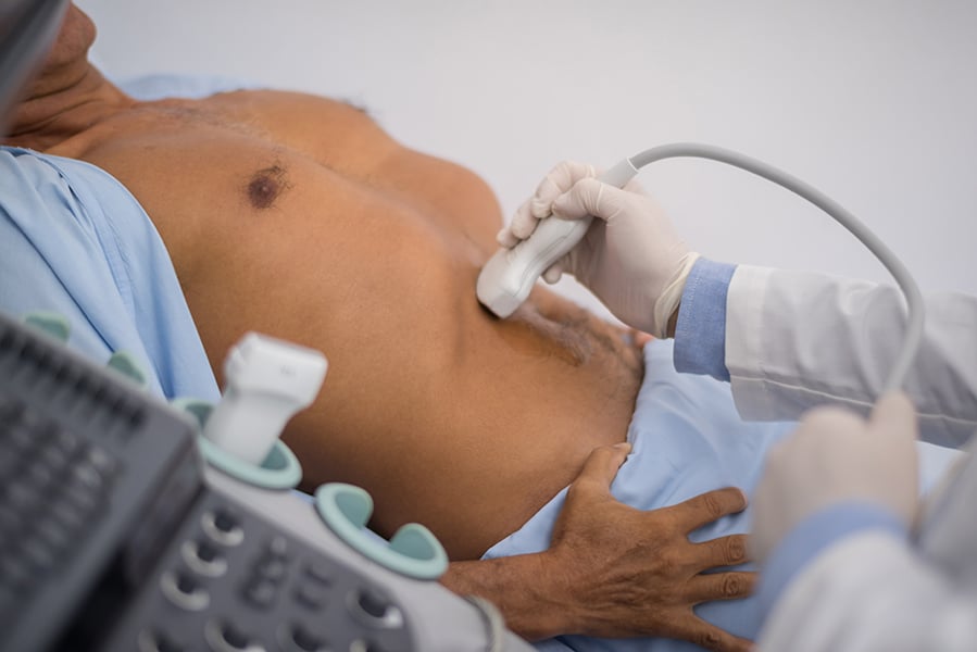 a man is having a private abdominal ultrasound scan in London